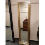 A traditional gilded style mirror,