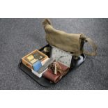 A tray of fishing bag of fishing accessories, miniature brass wheel, mantel clock, vintage camera,
