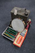 A tray of vintage BP oil can, tambourine, boxed Pifco trouser press, brass hand bell,