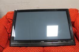 A Hitachi 50 inch plasma TV with built in HDD recorder (no table stand, no lead,