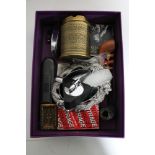 A box of collectables including ashtray, table and pocket lighters,