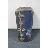 An early 20th century metal bound travelling trunk