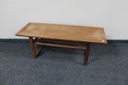 A mid 20th century teak coffee table