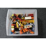 A box of mid century and later die cast vehicles, car transporter,