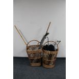Two 20th century wicker log baskets containing parasol, cricket set, sticks, peacock feathers,