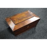 A Regency mahogany sarcophagus-form work box on brass feet