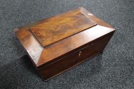 A Regency mahogany sarcophagus-form work box on brass feet