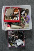 A crate of costume jewellery, paint brushes,