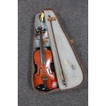 An early 20th century violin and bow in fitted case CONDITION REPORT: 14 inch back