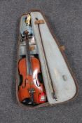 An early 20th century violin and bow in fitted case CONDITION REPORT: 14 inch back