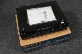 A boxed Sony integrated stereo amplifier TA-f248E.