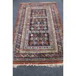 A Shiraz design rug,