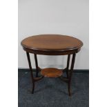 A Victorian inlaid mahogany occasional table