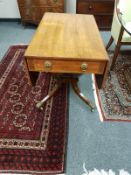 A nineteenth century inlaid rosewood flap sided sofa table,