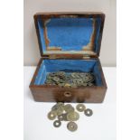 A Victorian walnut box with Chinese coins and tokens