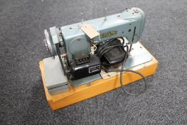 A mid 20th century Pax electric sewing machine