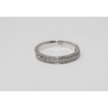 A heavy 18ct gold diamond half-eternity ring, approximately 0.