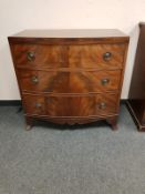 A Victorian mahogany bow fronted three drawer chest,