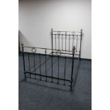 A Victorian cast iron and brass 4' bed frame
