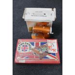 A boxed mid 20th century Scarlet Lock Stitch sewing machine together with a retro table football