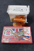 A boxed mid 20th century Scarlet Lock Stitch sewing machine together with a retro table football