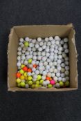 A box of a large quantity of golf balls