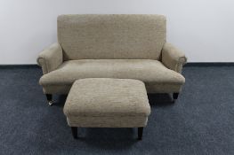 A good quality hand made Delcor beech framed settee with high density comfort cushions and matching