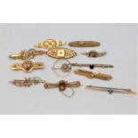 A good collection of 18ct and 15ct gold brooches CONDITION REPORT: 18ct - 3.3g.