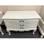 A contemporary white three drawer chest, width 100 cm.