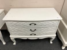 A contemporary white three drawer chest, width 100 cm.