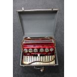 A cased Parrot piano accordion