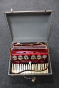 A cased Parrot piano accordion