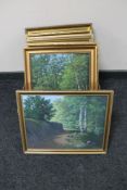 A box of nine framed Thomas Clay oil paintings of woodland scenes and still lifes