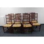 A set of eight stained beech farmhouse kitchen chairs