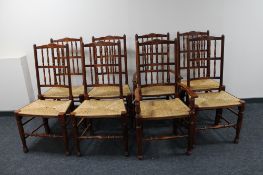 A set of eight stained beech farmhouse kitchen chairs