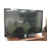 An LG 55 inch 3D Smart TV model number 55LW550T with remote control.