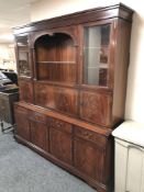 An inlaid mahogany Strongbow cocktail display unit fitted with cupboards and drawers beneath
