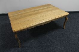 A French style oak coffee table