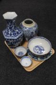 A tray of oriental blue and white wares, finger bowls, vase, ginger jar,