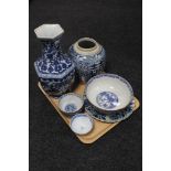 A tray of oriental blue and white wares, finger bowls, vase, ginger jar,