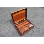 A Victorian walnut work box with lift out tray