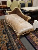 A contemporary gilt and bergere chaise longue, length 160 cm.