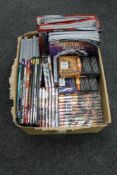 A box of Dr Who DVD's and magazines,