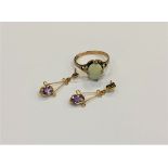 A gold and opal ring and a pair of gold amethyst earrings