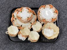 A tray of approximately thirty-three pieces of Victorian tea china