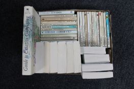 A box of twenty-four Agatha Christie paperback books together with a further ten novels etc