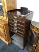 A late Victorian mahogany music cabinet