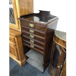 A late Victorian mahogany music cabinet