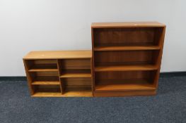A set of teak open bookshelves together with set of teak wall shelves