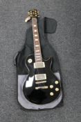 A Les Paul style electric guitar by Vintage,